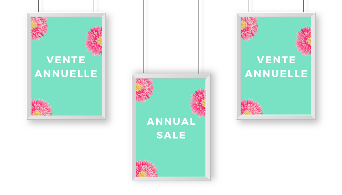 Photo: An example with two signs saying 'Vente Annuelle' with a sign in the middle hanging lower saying 'Annual Sale'
