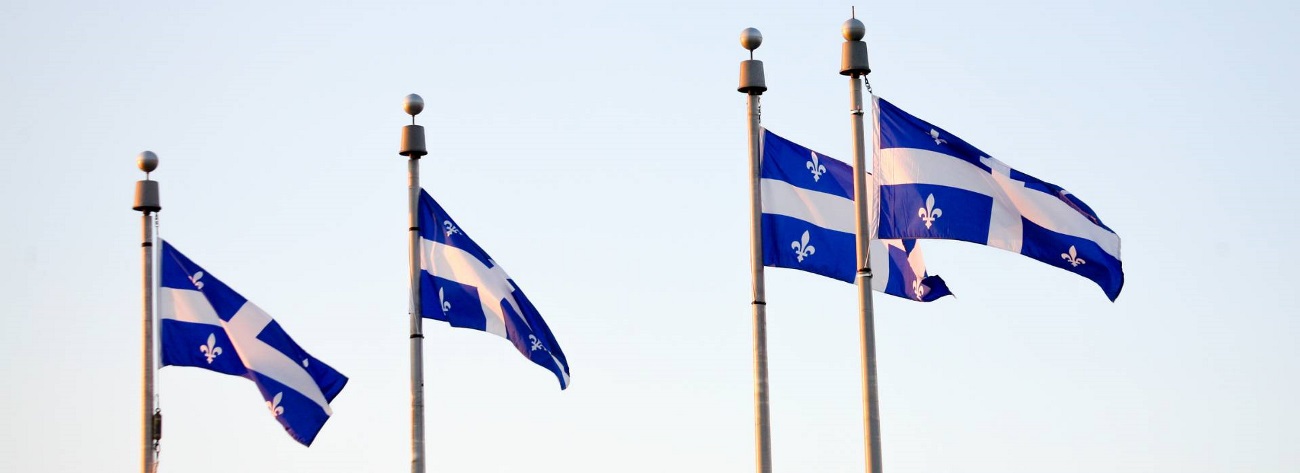 Quebec Flags - Link to [Webinar Replay] Branding and French Language Requirements in Québec
