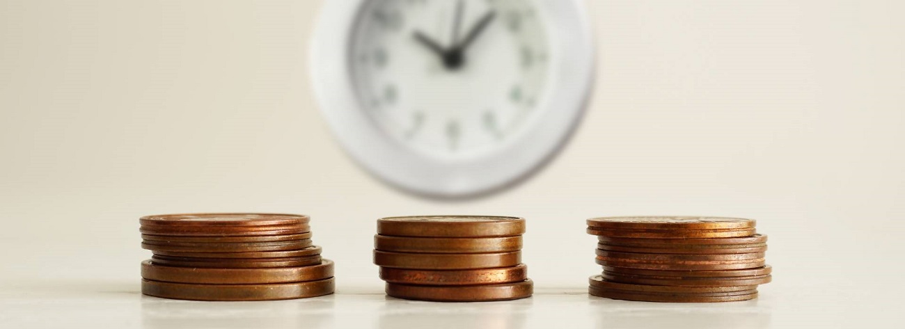 coins and clock representing cost and money