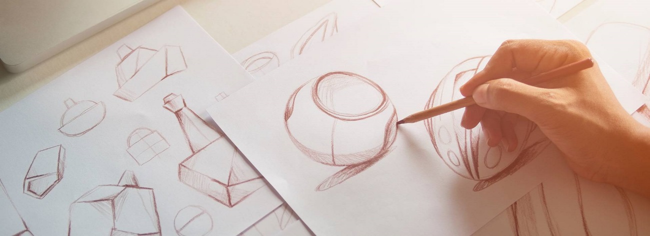 Product designer sketching on paper